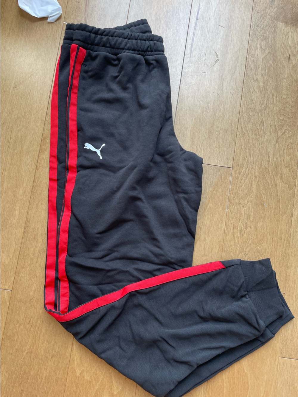 Puma F1 Black Joggers with Red Side Stripes